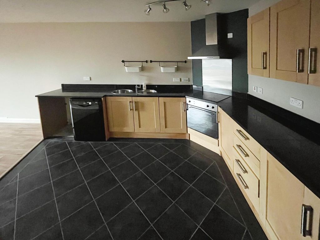 Property photo 3 of 8 Kitchen