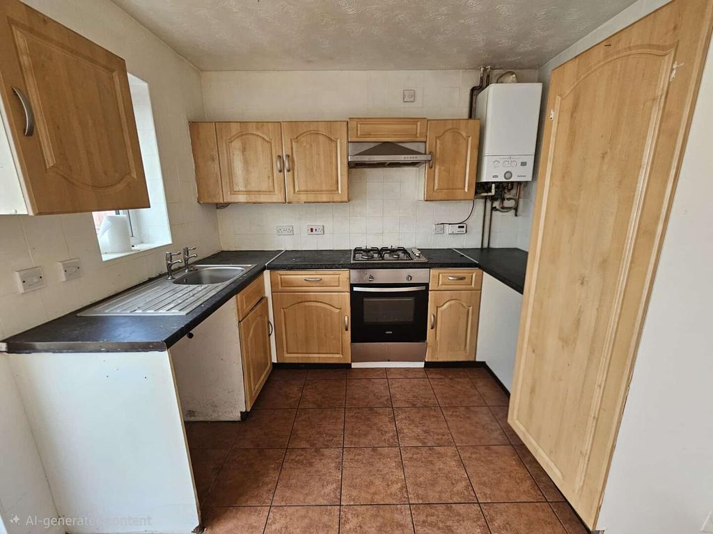 Property photo 3 of 8 Kitchen