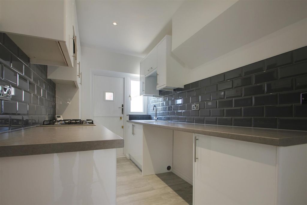 Property photo 3 of 12 Kitchen