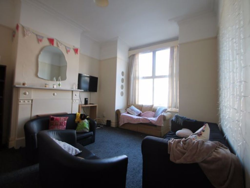 Property photo 1 of 10 A Cozy Living Room Featuring Comfortable Seating A...