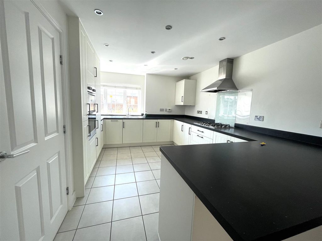 Property photo 2 of 18 Kitchen Area