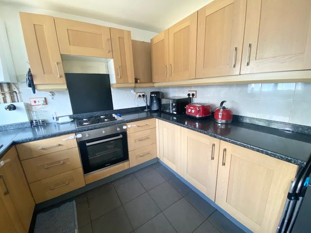 Property photo 3 of 12 Kitchen