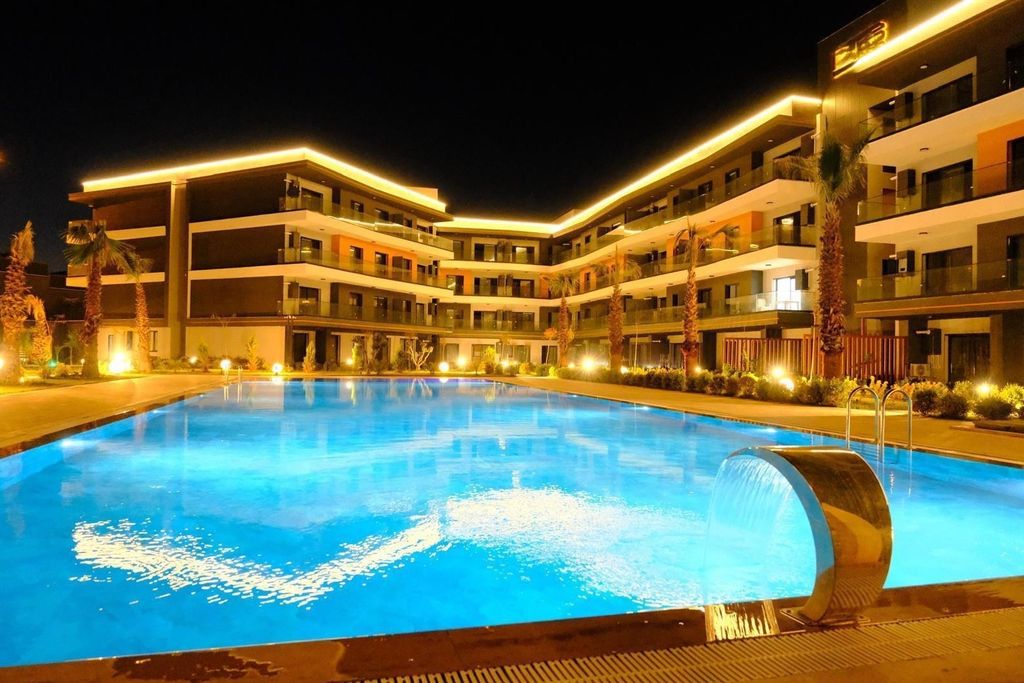 Property photo 2 of 20 Luxurious Kusadasi Apartments With On-Site Facilities For Sale - Night Lighting In The Complex