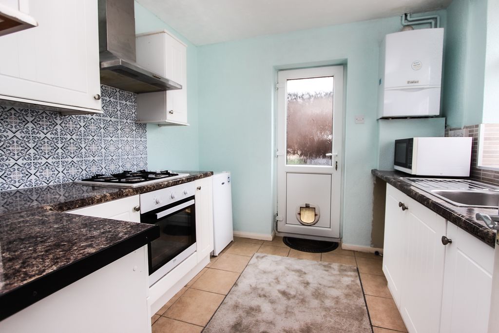 Property photo 2 of 10 Kitchen Area