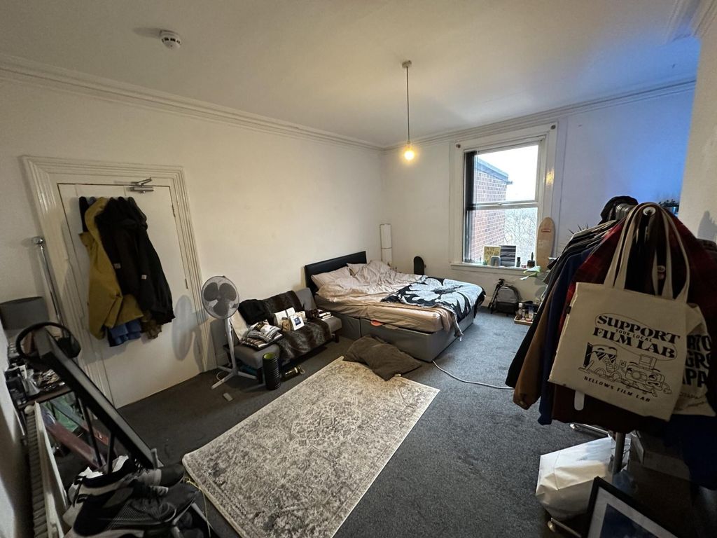 Property photo 1 of 9 Spacious Master Bedroom With Large Window...