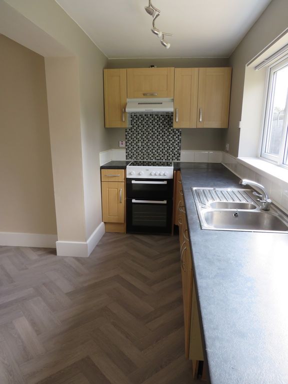 Property photo 3 of 12 Kitchen