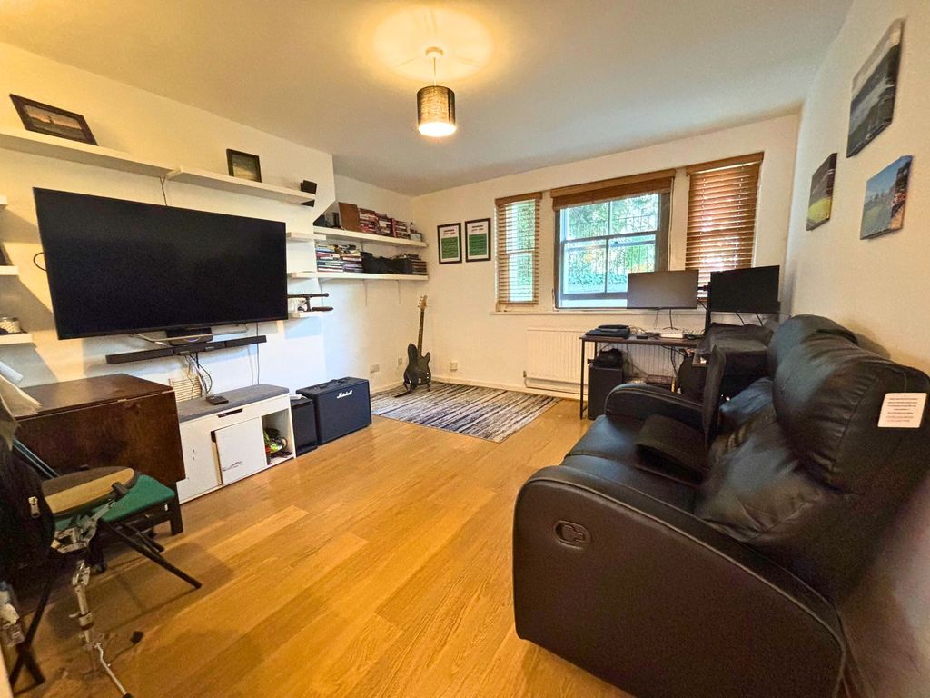Property photo 3 of 12 Living Area