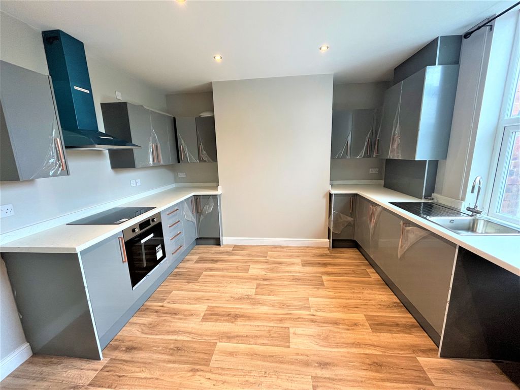 Property photo 2 of 12 Kitchen