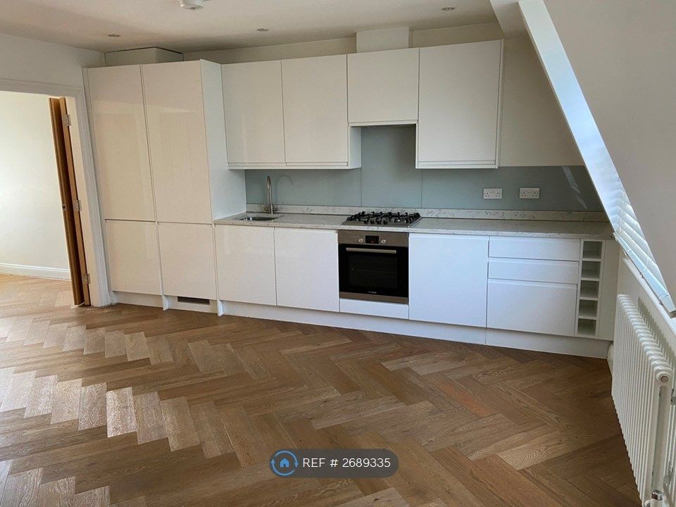 Property photo 3 of 11 Kitchen From Living