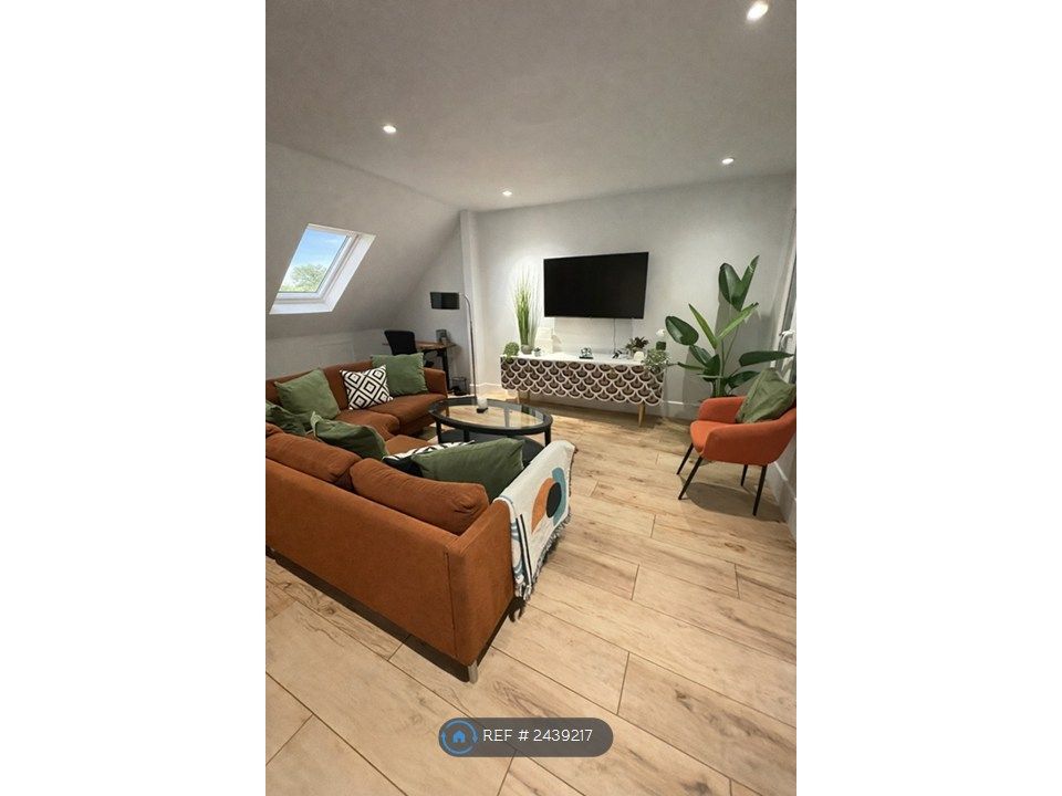 Property photo 1 of 16 Living Area