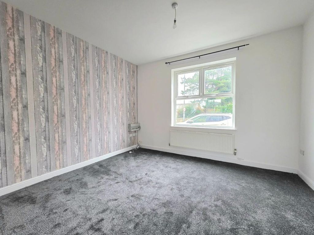 Property photo 3 of 21 Front Living Room