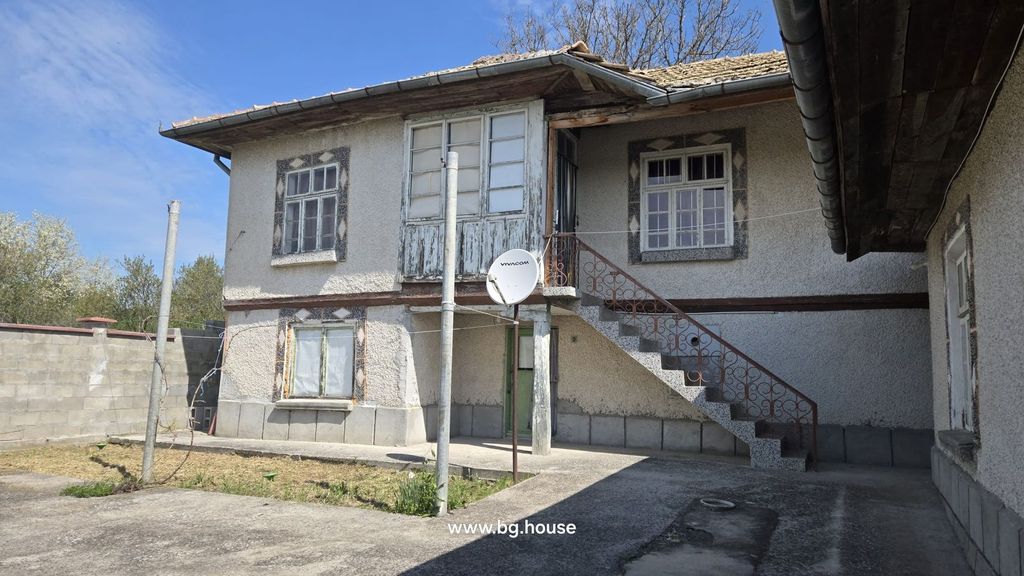 Property photo 3 of 41 Rear View Showing External Staircase, Satellite Dish, And Concrete Yard Area