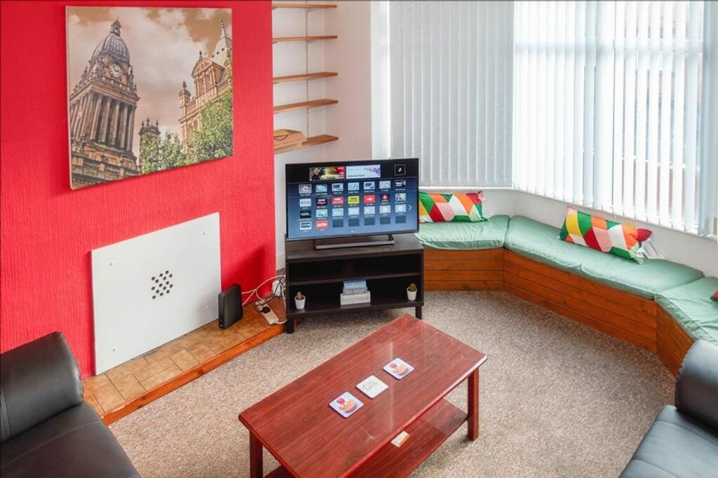 Property photo 2 of 18 A Bright And Inviting Living Room Featuring Comfor...