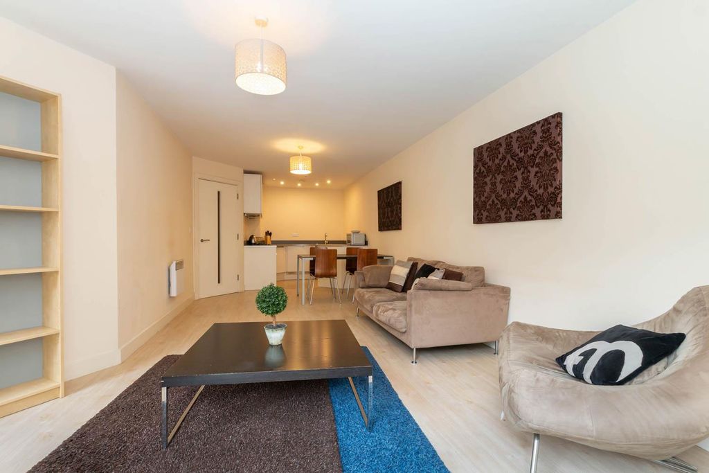 Property photo 3 of 11 Living Area