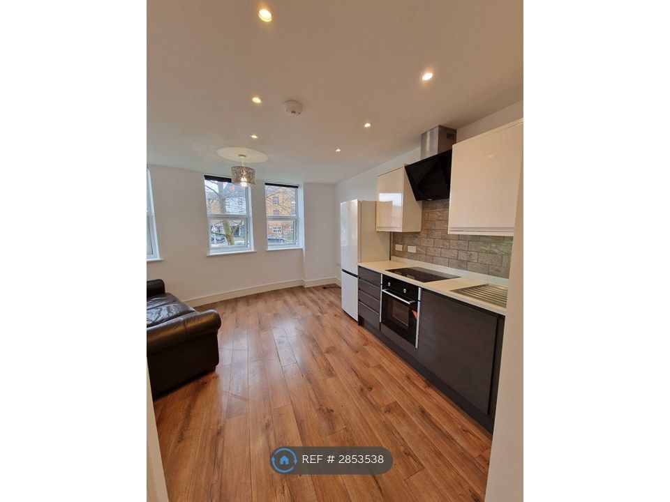 Property photo 3 of 12 Kitchen And Living Room