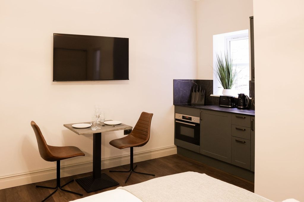 Property photo 3 of 10 Stylish Kitchenette With Modern Dining Area...