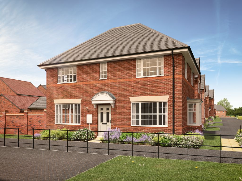 Property photo 1 of 8 A Red Brick House With A White Door And Large Windows Sits Behind A Low Fence And Flowerbed