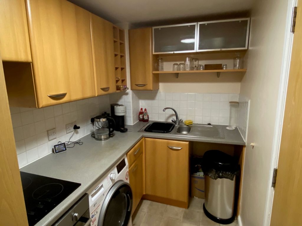 Property photo 3 of 12 Kitchen