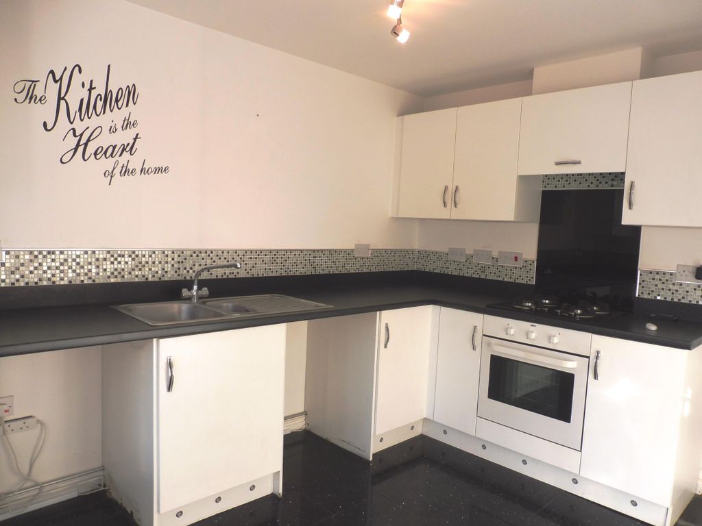 Property photo 3 of 7 Kitchen