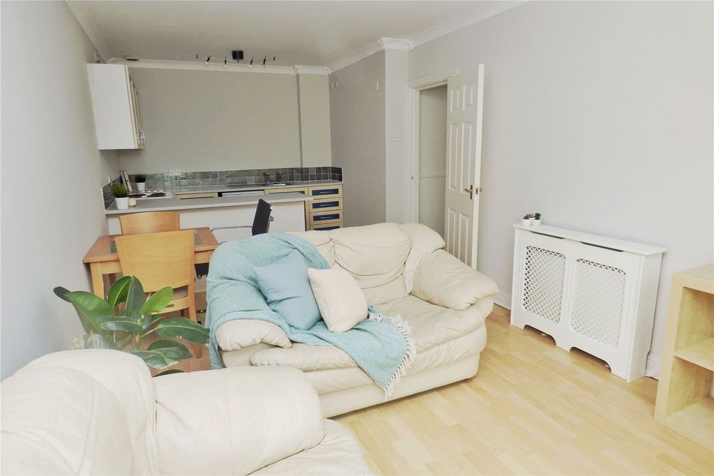 Property photo 2 of 11 Living Area