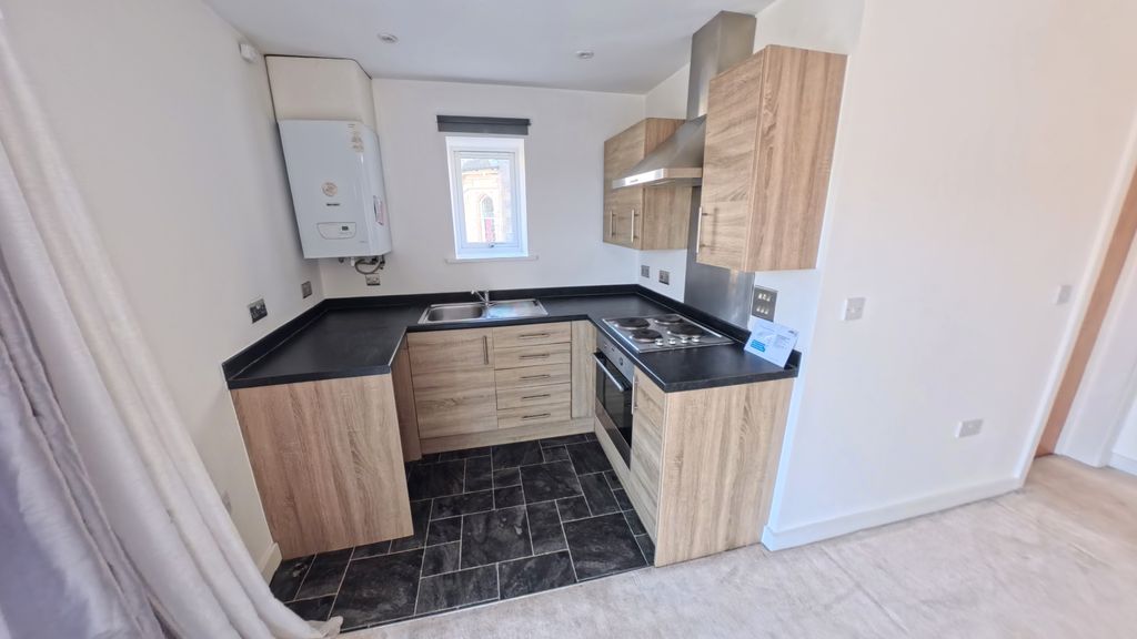 Property photo 3 of 6 Kitchen
