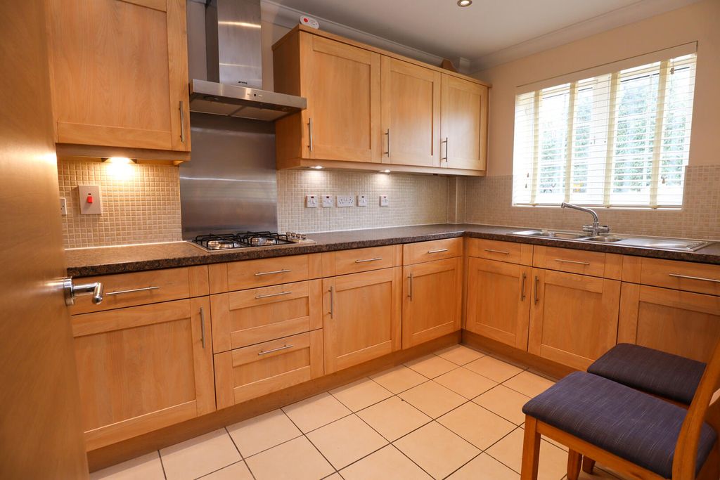 Property photo 3 of 12 Kitchen