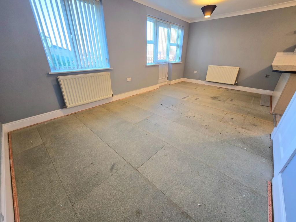 Property photo 2 of 12 Living Area