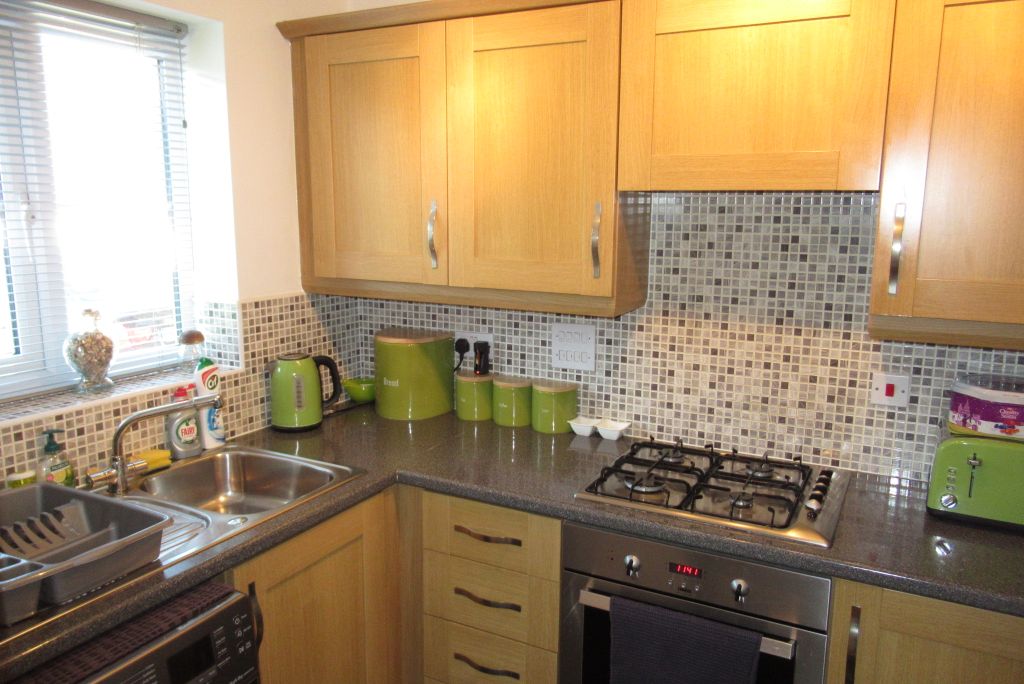 Property photo 2 of 11 Kitchen