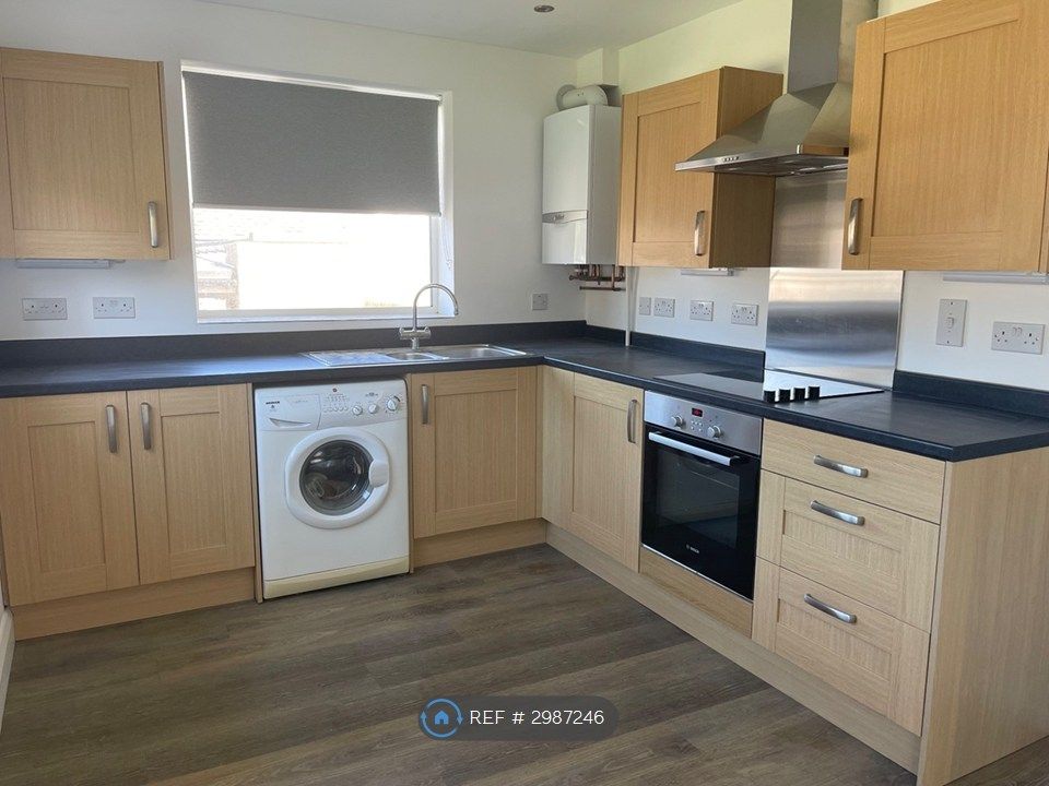 Property photo 3 of 12 Kitchen