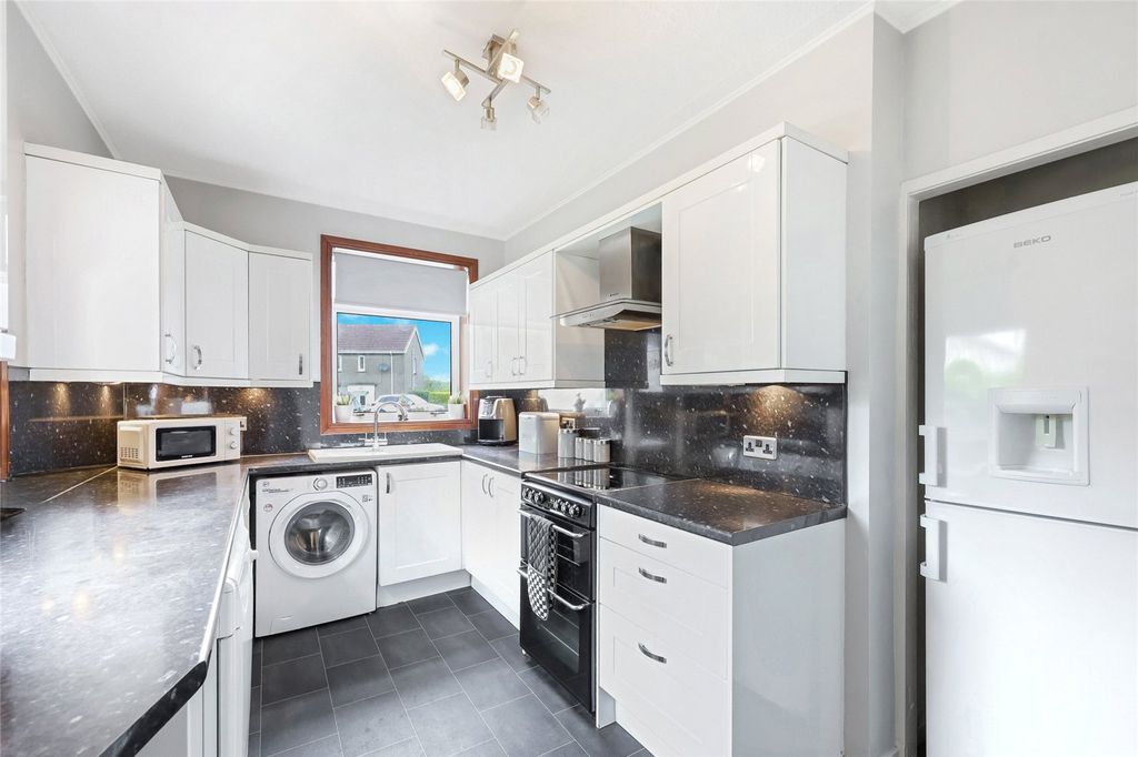 Property photo 3 of 13 Kitchen