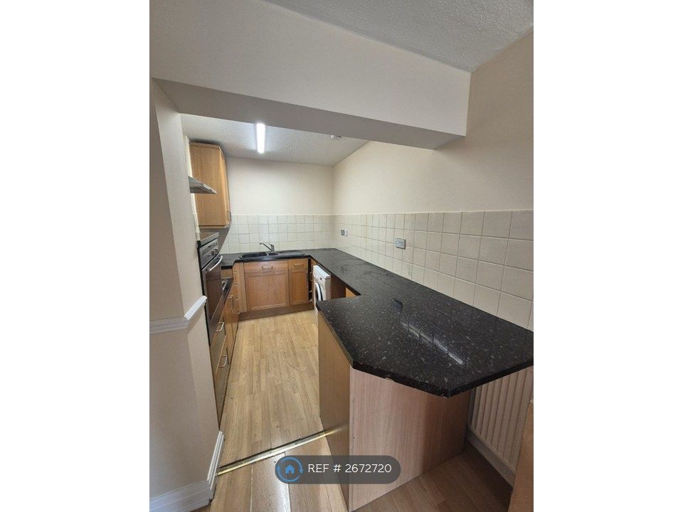 Property photo 2 of 12 Kitchen With Breakfast Bar