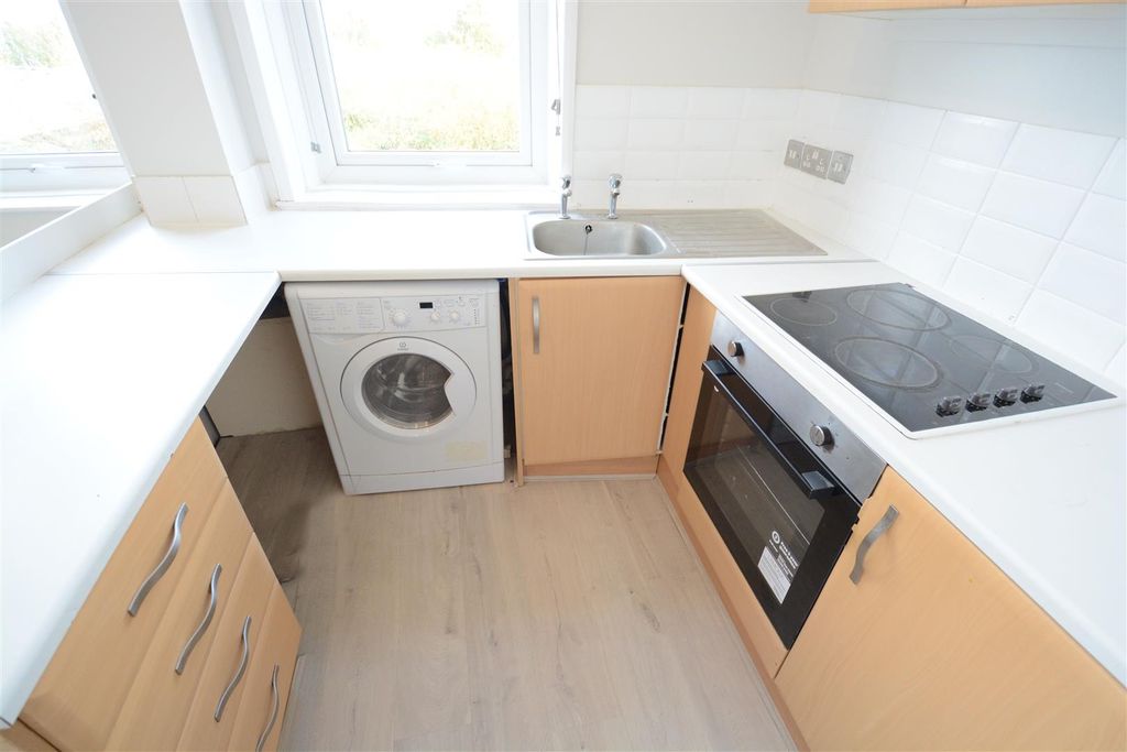 Property photo 2 of 6 Kitchen Area