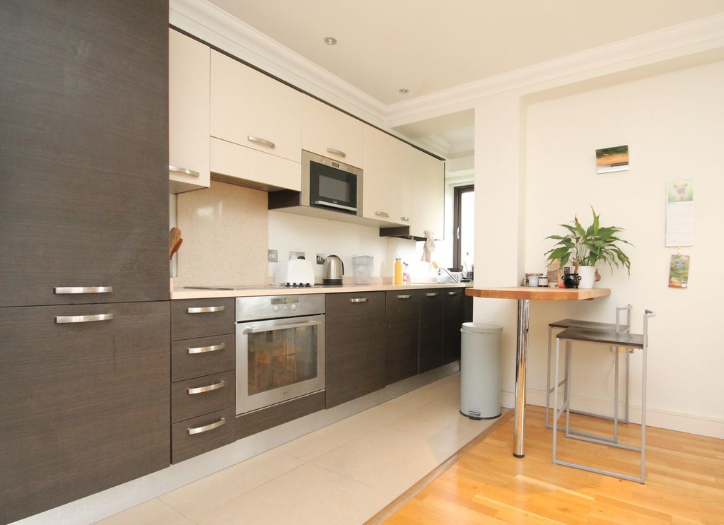 Property photo 3 of 12 Kitchen