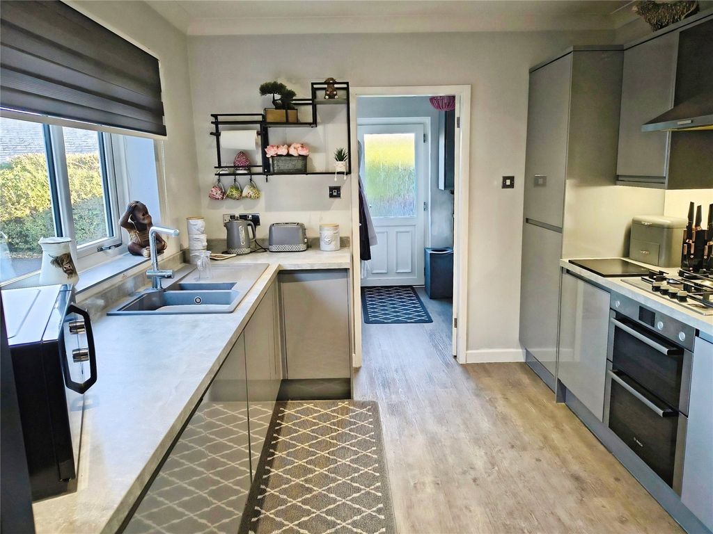 Property photo 2 of 11 Kitchen