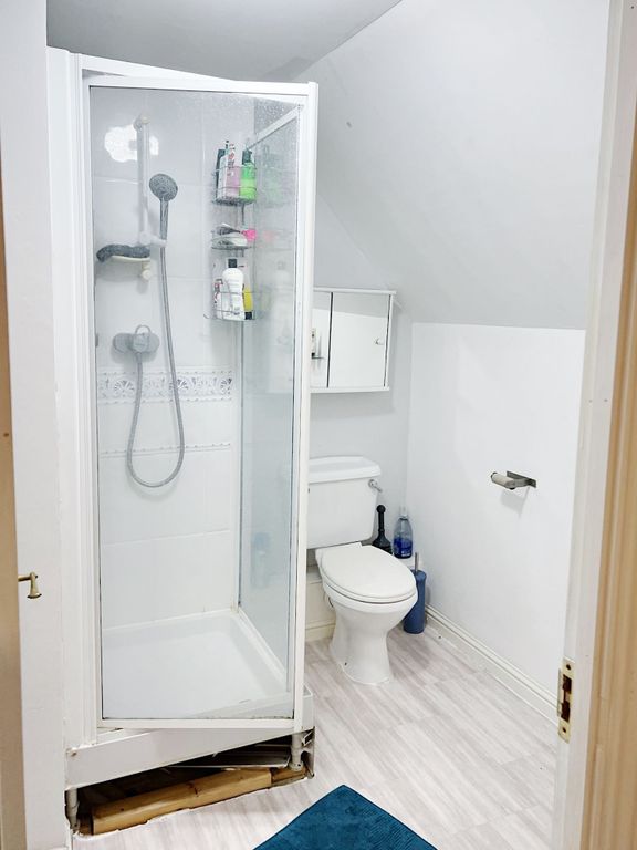 Property photo 3 of 10 Compact, Modern Bathroom With A Corner Shower Cubi...