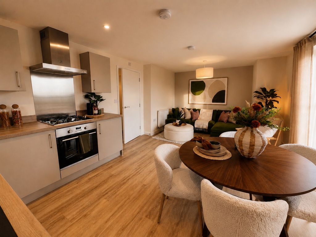 Property photo 3 of 7 A Modern Kitchen With A Dining Table In The Foreground Transitions Into A Cozy Living Room With A So