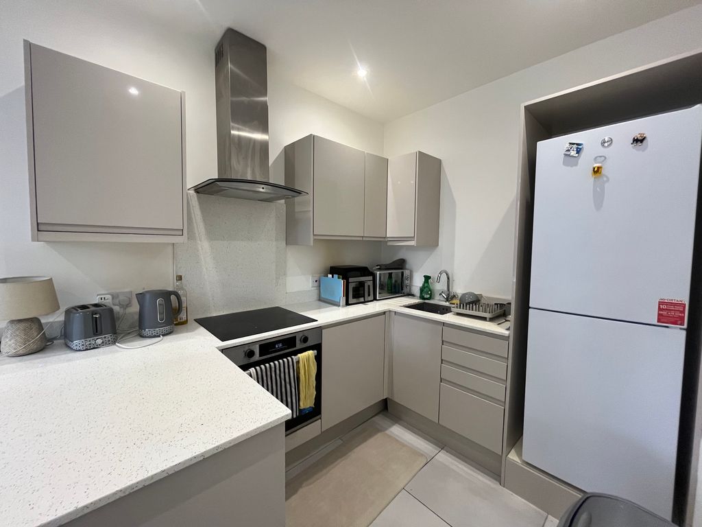 Property photo 3 of 7 Kitchen