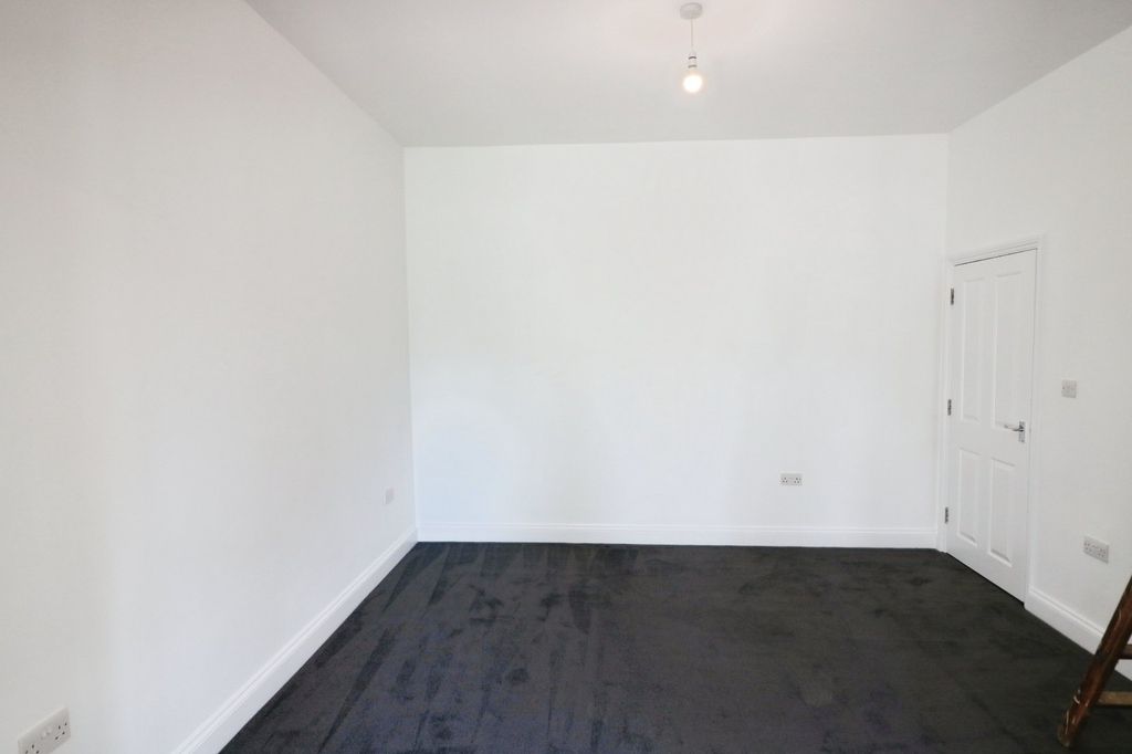 Property photo 3 of 12 Living Room 2