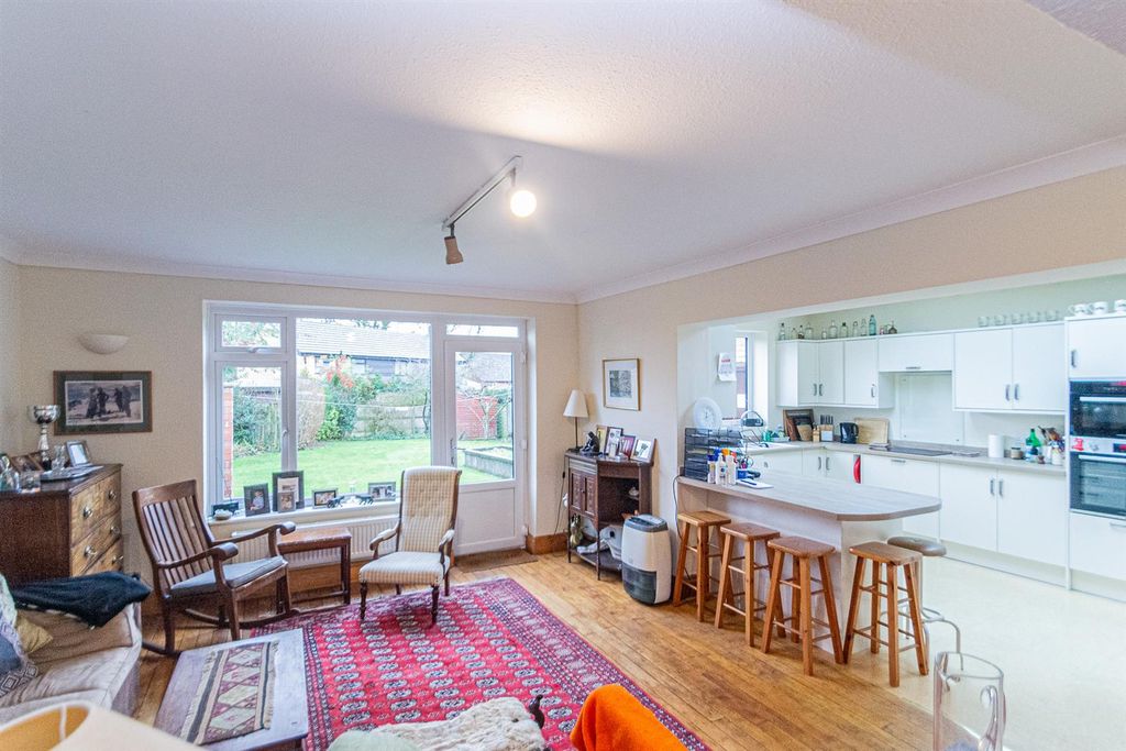Property photo 2 of 18 Family Room &amp; Dining Kitchen