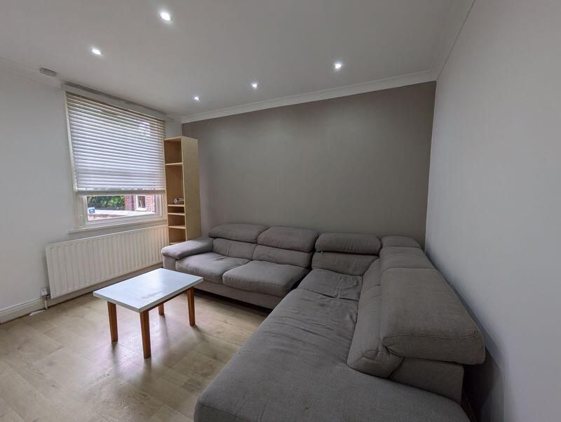 Property photo 2 of 8 A Spacious, Bright Living Room With A Large Comfor...