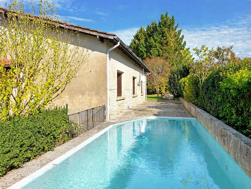 Property photo 2 of 30 Pool_Reflections_Sunlight