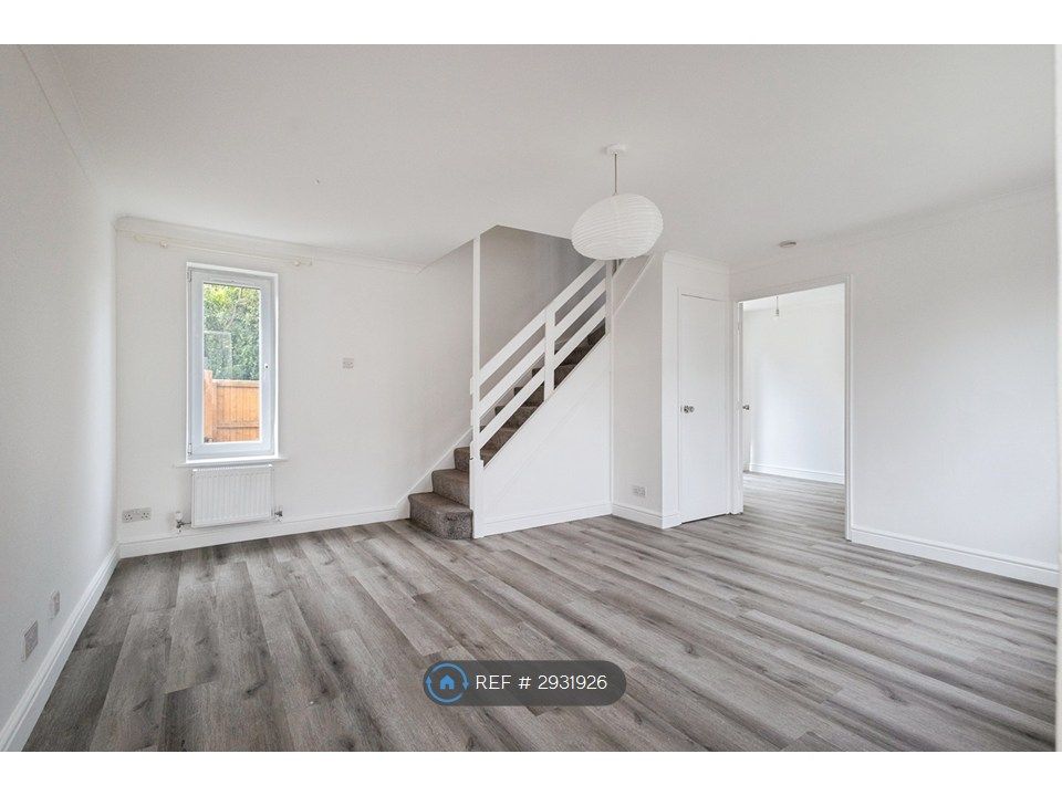 Property photo 2 of 16 Front Door & Mini-Hallway > Living Room Rear Wall