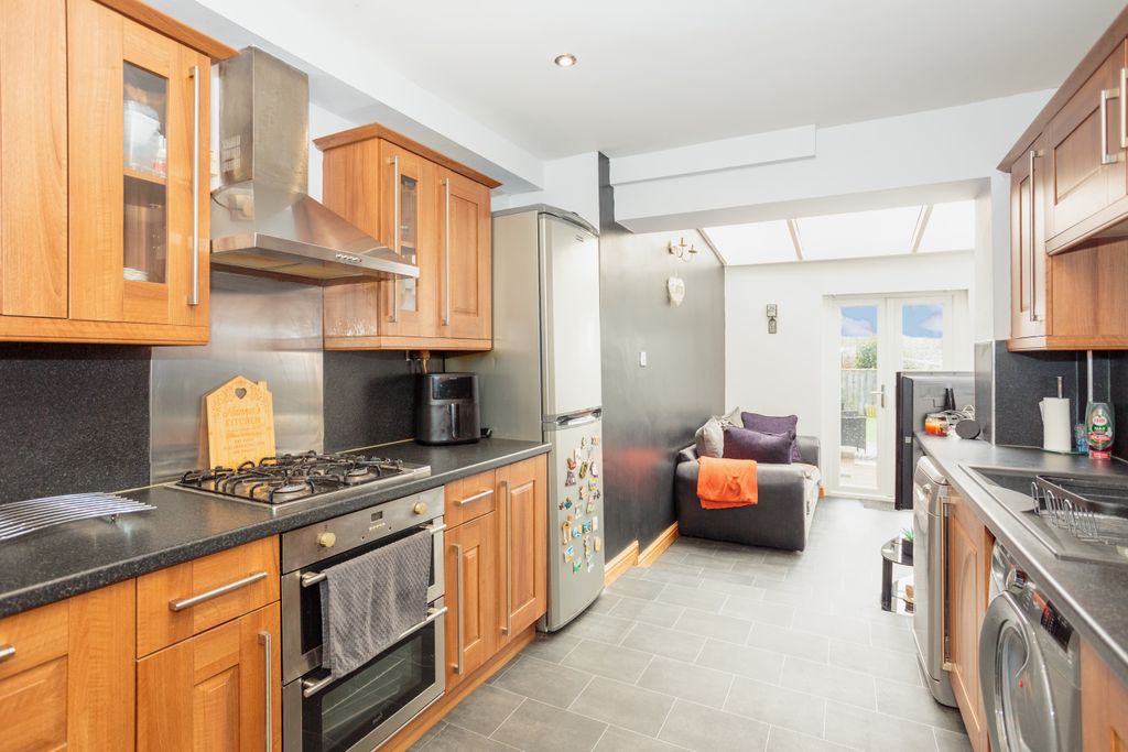 Property photo 3 of 32 Kitchen/Sun Room