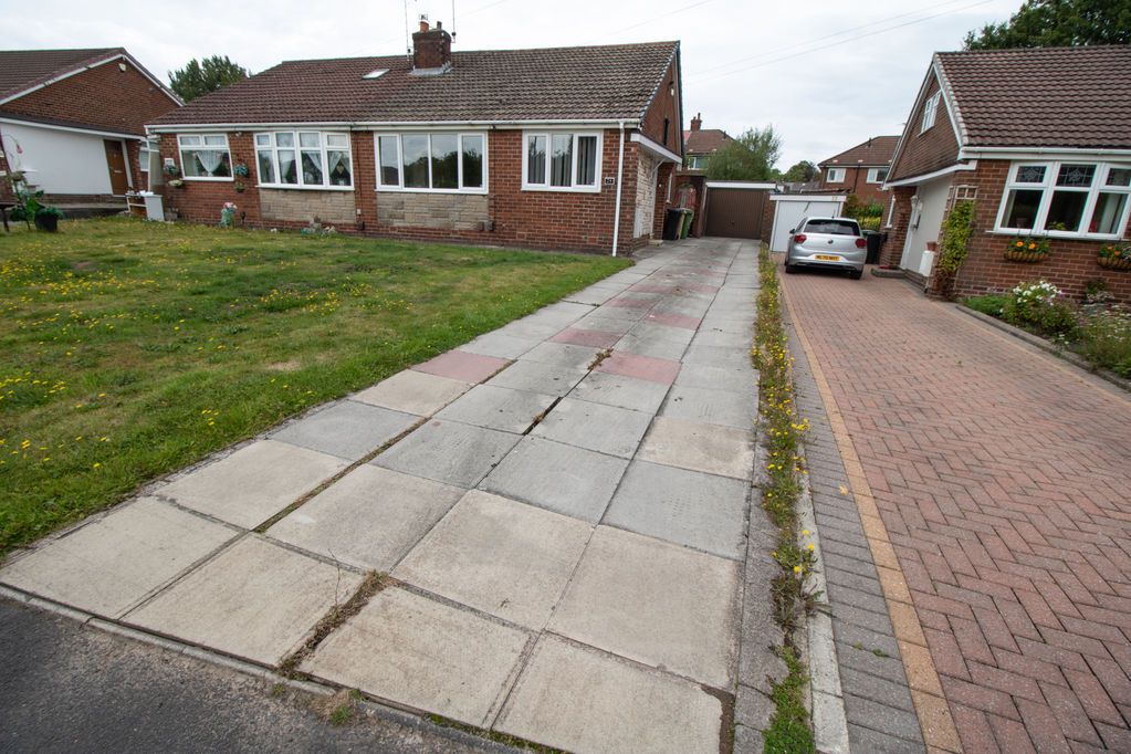 Property photo 1 of 11 Front Elevation And Driveway