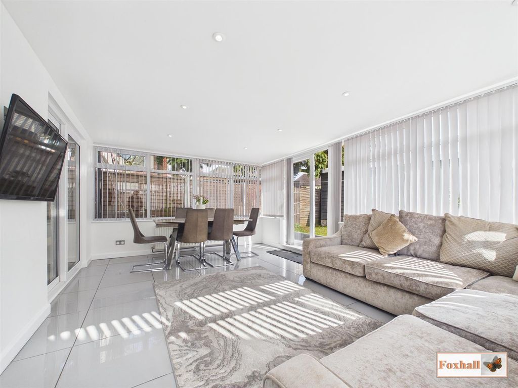 Property photo 3 of 19 Sun Room / Dining Room