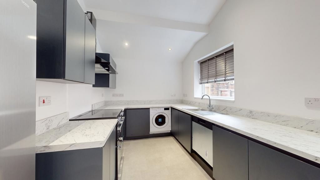 Property photo 1 of 12 A Modern And Spacious Kitchenette With Sleek Cabin...