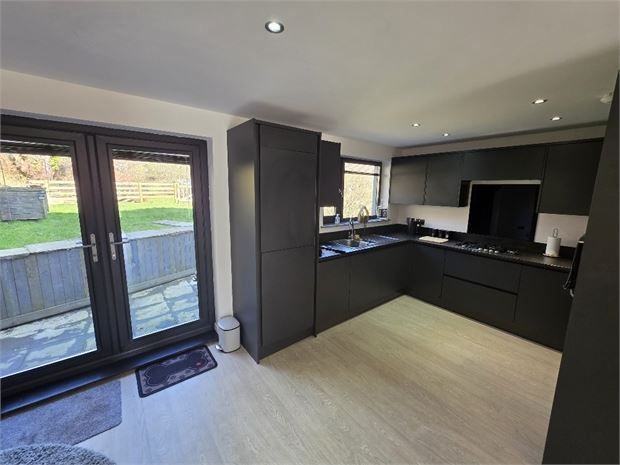 Property photo 2 of 12 Kitchen