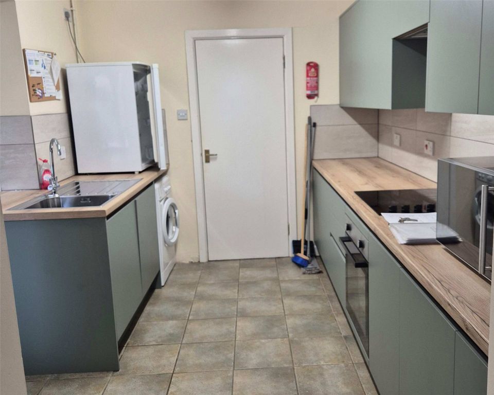 Property photo 2 of 15 Kitchen