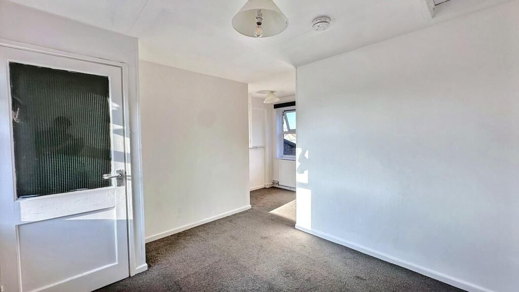 Property photo 3 of 6 Bright, Neutral Hallway With Clean White Walls, fi...