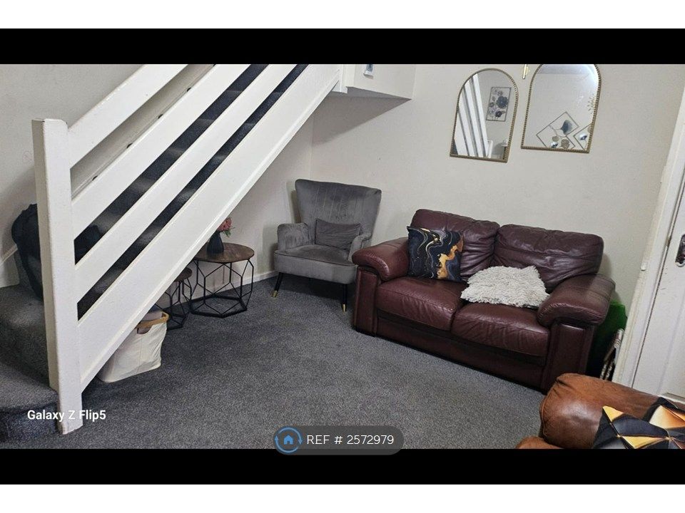 Property photo 3 of 8 Sitting Room